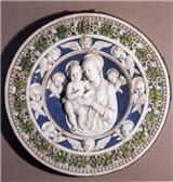 rond relif van geglazuurd terracotta met "Moeder met kind" van Andrea della Robbia, diameter 1,08 meter. Collectie Muse des Beaux-Arts, Nmes,