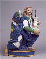 engel als kaarsstandaard, toegeschreven aan Giovanni della Robbia, gedeeltelijk geglazuurd terracotta, 50 cm. hoog. Collectie Muse du Louvre, Parijs.